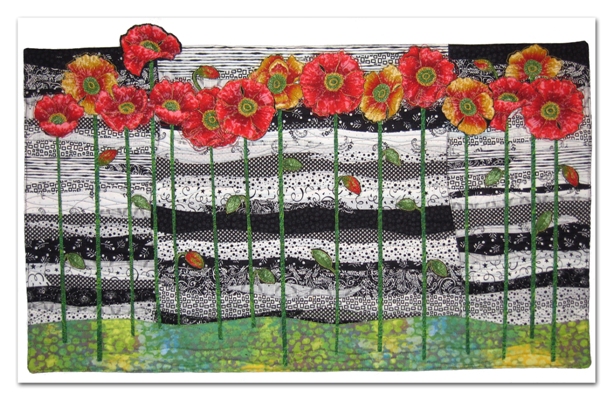 I made this in March 2009 while on vacation with quilting friends at our beach house in California. I was inspired by all the California Poppies that were in bloom.